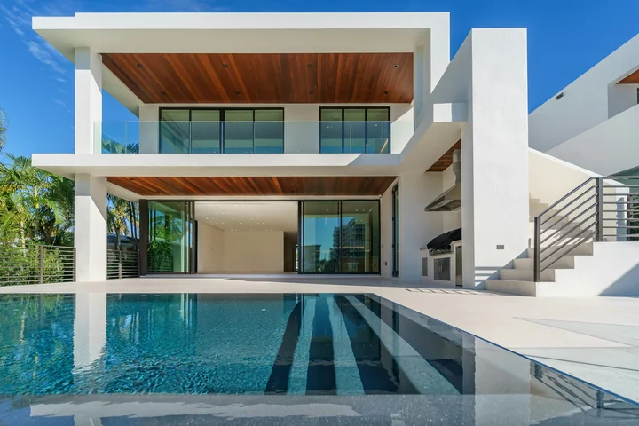 Architectural inspiration: wide dark-framed windows and patio glazing